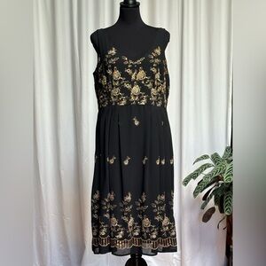 Black cocktail dress with embroidery and sequins. Size 16. Pretty detailing.